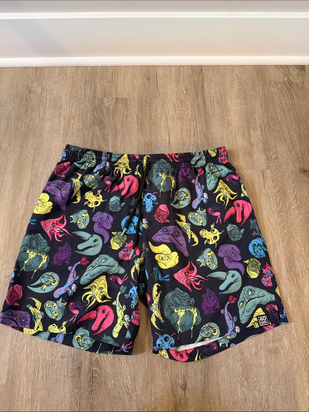 RSVLTS Men’s Black Swim Trunks with Multicolor Monster Faces